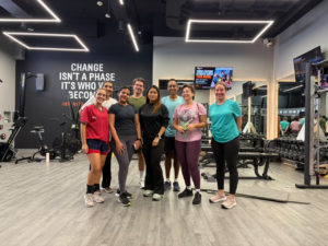 Small group strength training members at Infinite Change Fitness in Abu Dhabi